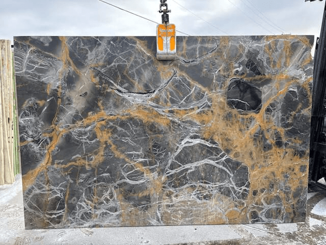 A black marble slab with white veins